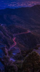 Preview wallpaper mountains, road, night, backlight, aerial view