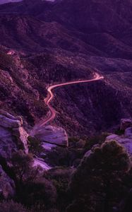 Preview wallpaper mountains, road, night, backlight, aerial view, sunset