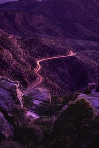 Preview wallpaper mountains, road, night, backlight, aerial view, sunset