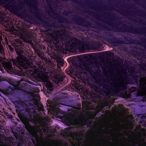 Preview wallpaper mountains, road, night, backlight, aerial view, sunset