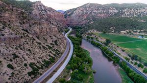 Preview wallpaper mountains, road, river, top view