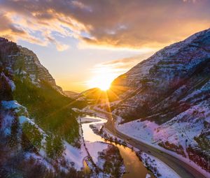 Preview wallpaper mountains, road, river, sun, landscape