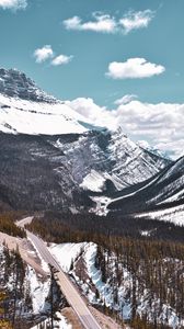 Preview wallpaper mountains, road, rocks, snow, trees