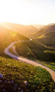 Preview wallpaper mountains, road, serpentine, sunset