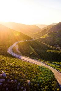 Preview wallpaper mountains, road, serpentine, sunset