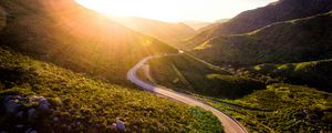 Preview wallpaper mountains, road, serpentine, sunset