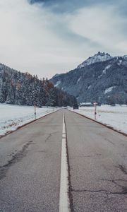 Preview wallpaper mountains, road, snow, marking, trees