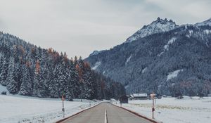 Preview wallpaper mountains, road, snow, marking, trees