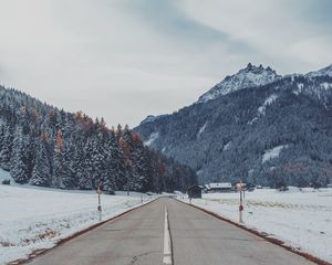 Preview wallpaper mountains, road, snow, marking, trees