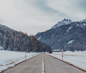 Preview wallpaper mountains, road, snow, marking, trees