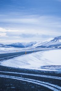 Preview wallpaper mountains, road, turn, snow, winter, snowy