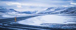 Preview wallpaper mountains, road, turn, snow, winter, snowy