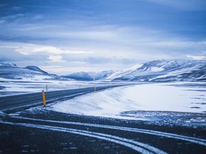 Preview wallpaper mountains, road, turn, snow, winter, snowy