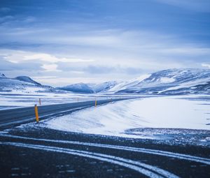 Preview wallpaper mountains, road, turn, snow, winter, snowy