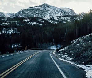 Preview wallpaper mountains, road, turn, peaks, snow