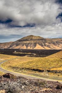 Preview wallpaper mountains, road, winding, sky