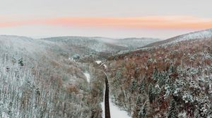 Preview wallpaper mountains, road, winter, aerial view, snow