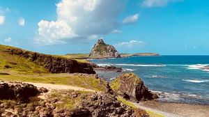 Preview wallpaper mountains, rock, coast, grass