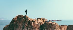 Preview wallpaper mountains, rock, man, freedom, cliff