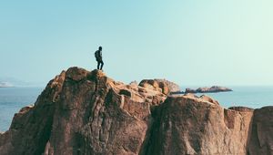 Preview wallpaper mountains, rock, man, freedom, cliff