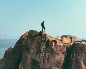 Preview wallpaper mountains, rock, man, freedom, cliff