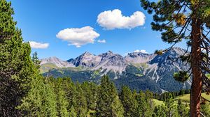 Preview wallpaper mountains, rocks, branches, trees, sky, clouds