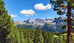 Preview wallpaper mountains, rocks, branches, trees, sky, clouds