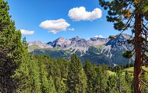 Preview wallpaper mountains, rocks, branches, trees, sky, clouds
