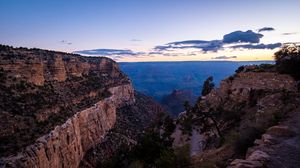 Preview wallpaper mountains, rocks, clouds, sunset, sky, landscape