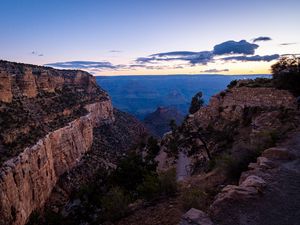 Preview wallpaper mountains, rocks, clouds, sunset, sky, landscape