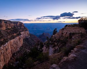 Preview wallpaper mountains, rocks, clouds, sunset, sky, landscape