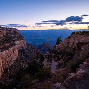 Preview wallpaper mountains, rocks, clouds, sunset, sky, landscape