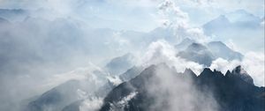 Preview wallpaper mountains, rocks, clouds, fog, grass