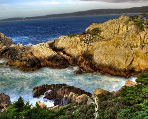 Preview wallpaper mountains, rocks, coast, stones, sea, vegetation, horizon, landscape