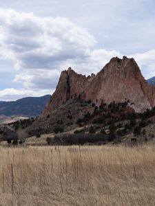 Preview wallpaper mountains, rocks, field, clouds, nature