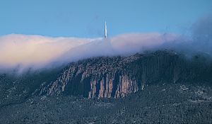 Preview wallpaper mountains, rocks, fog, tower, nature