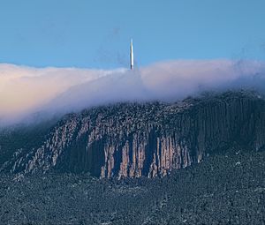 Preview wallpaper mountains, rocks, fog, tower, nature