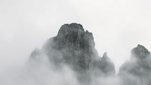 Preview wallpaper mountains, rocks, fog, slope, grass