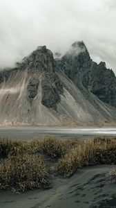 Preview wallpaper mountains, rocks, fog, cloud, grass