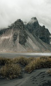 Preview wallpaper mountains, rocks, fog, cloud, grass