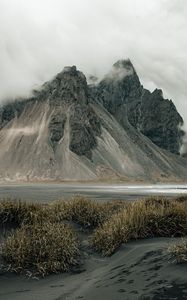Preview wallpaper mountains, rocks, fog, cloud, grass