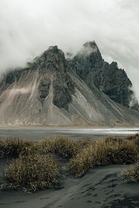 Preview wallpaper mountains, rocks, fog, cloud, grass