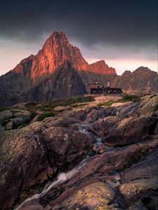 Preview wallpaper mountains, rocks, house, stones, stream