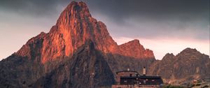 Preview wallpaper mountains, rocks, house, stones, stream