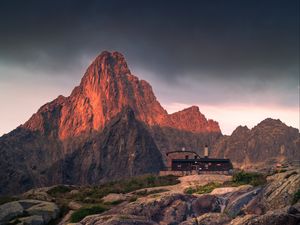 Preview wallpaper mountains, rocks, house, stones, stream