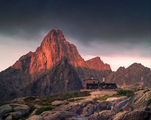 Preview wallpaper mountains, rocks, house, stones, stream