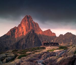 Preview wallpaper mountains, rocks, house, stones, stream