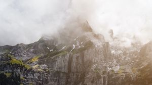 Preview wallpaper mountains, rocks, lake, fog, flowers
