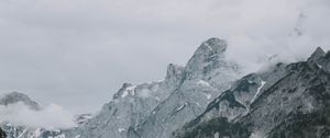 Preview wallpaper mountains, rocks, lake, fog, building