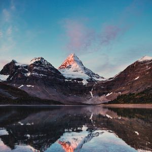 Preview wallpaper mountains, rocks, lake, snowy, reflection